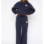 “White Fox Sweatpants for women, offering a relaxed fit, soft fabric, and modern streetwear style.”