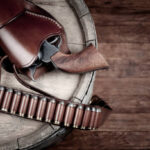 What is the advantage of custom leather holsters in retention and security?